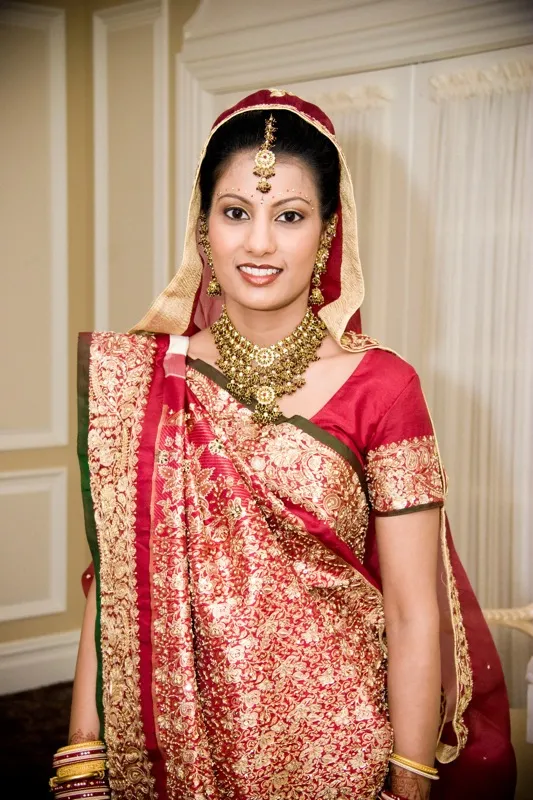 Bride in traditional saree with professional bridal makeup